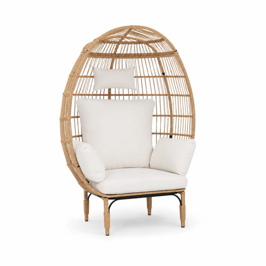 Sillón de ratán sintético en forma de huevo con cojines blancos